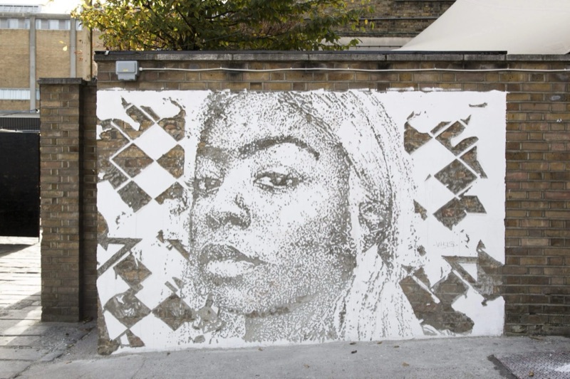 Hennessy x Vhils - carved portrait wall for Making the Invisible Visible, London