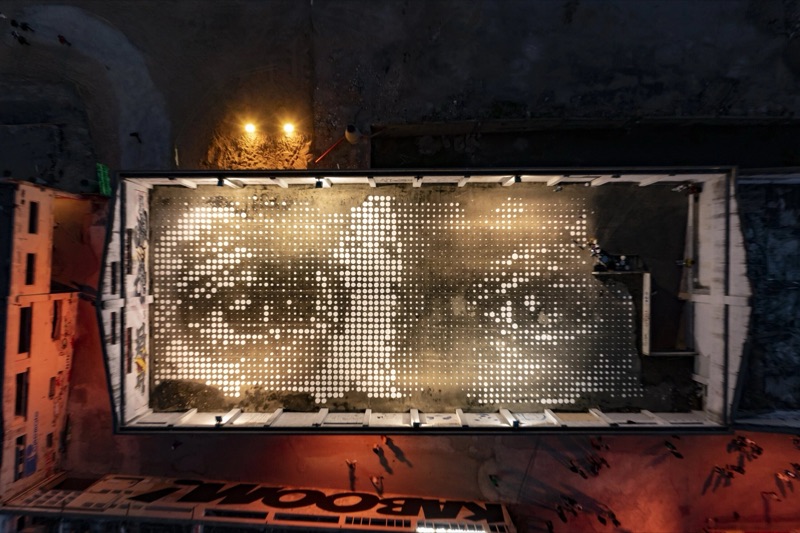 Monumental dot-matrix carved eyes as stage backdrop inside the Panorâmico, Iminente 2019