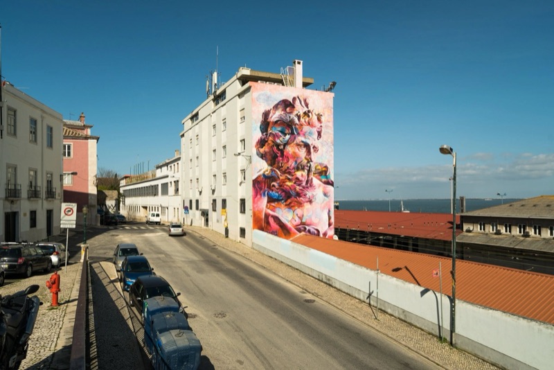 PichiAvo Poseidon mural over the Santa Apolónia riverfront, Lisbon